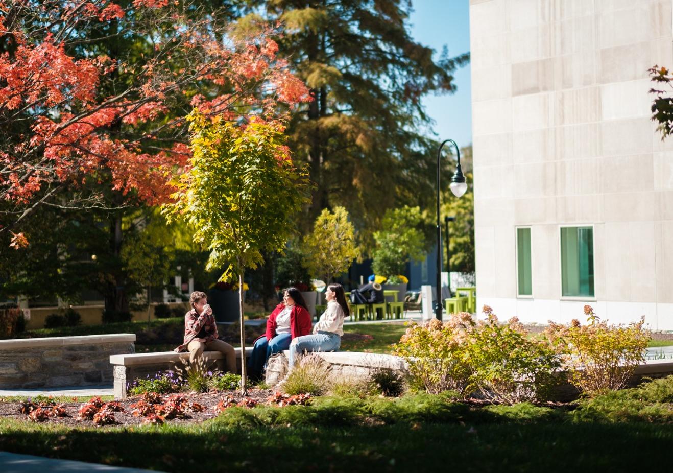 The Well exterior with students 